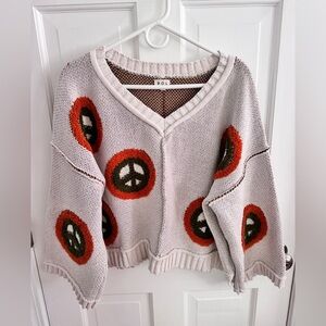 POL Cream and Orange V-Neck Sweater with Retro Peace Signs